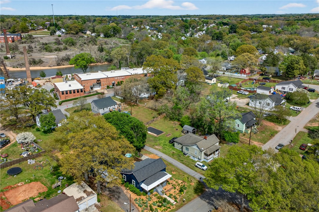 21 Haynes Street Piedmont, SC 29673 - Photo 34 of 35 This elevated view captures the charming neighborhood, highlighting residential homes nestled among lush greenery.