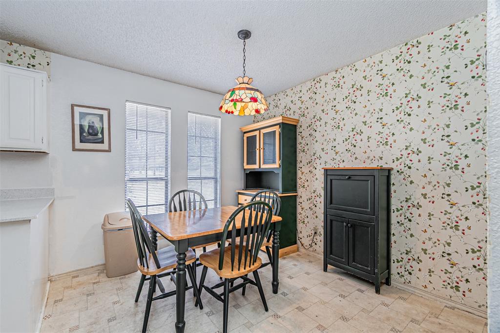 108 Cole Road Red Oak, TX 75154 - Photo 19 of 30 a view of a livingroom with furniture and chandelier