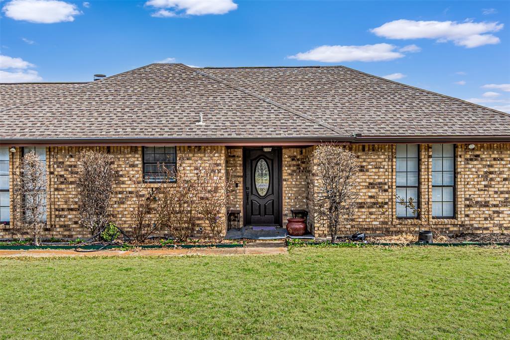 108 Cole Road Red Oak, TX 75154 - Photo 2 of 30 front view of a house with a garden