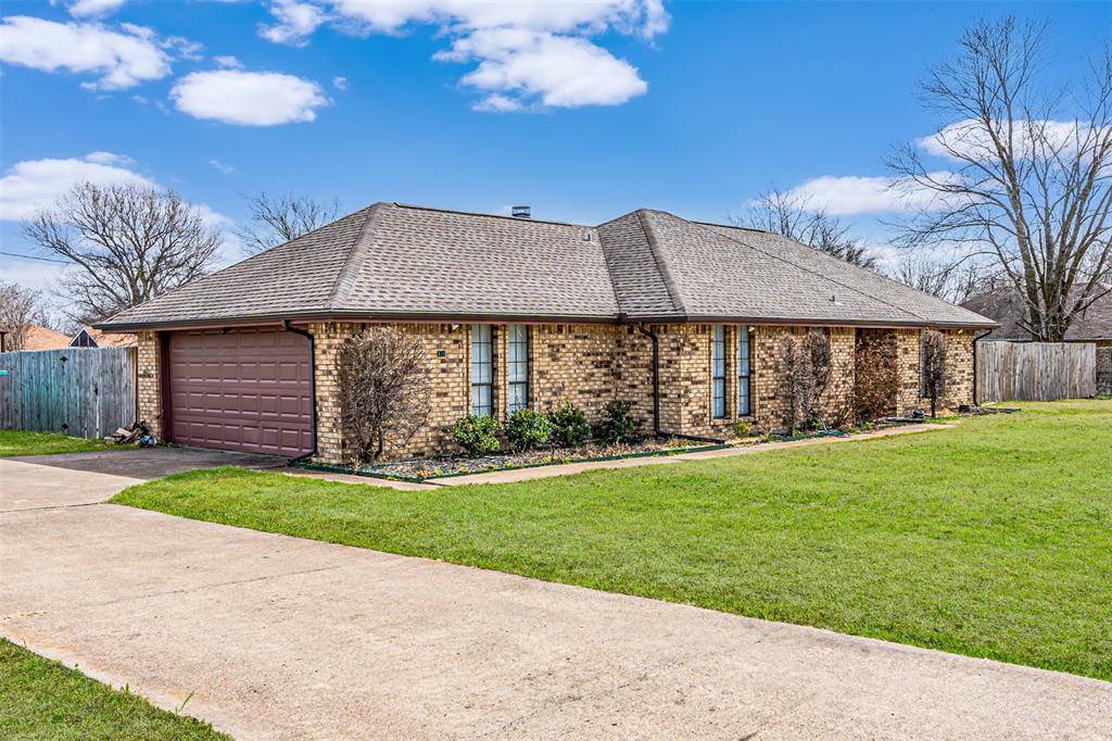 108 Cole Road Red Oak, TX 75154 - Photo 4 of 30 a front view of a house with garden