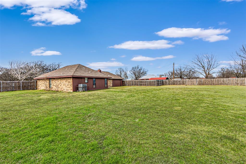 108 Cole Road Red Oak, TX 75154 - Photo 9 of 30 a view of an house with backyard and garden