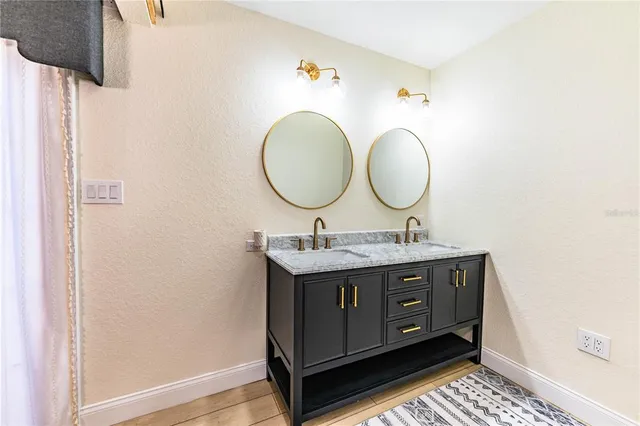 a view of a park with swings and trees