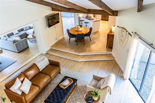 a kitchen with refrigerator and cabinets