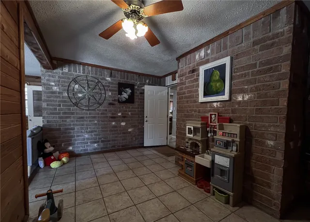 a view of empty room with windows