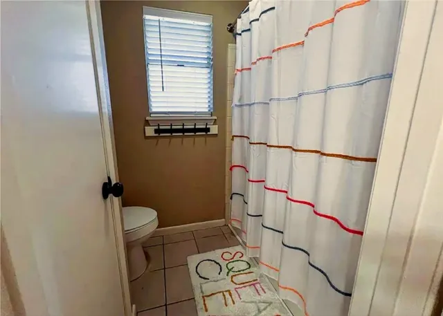 a bathroom with a sink and toilet