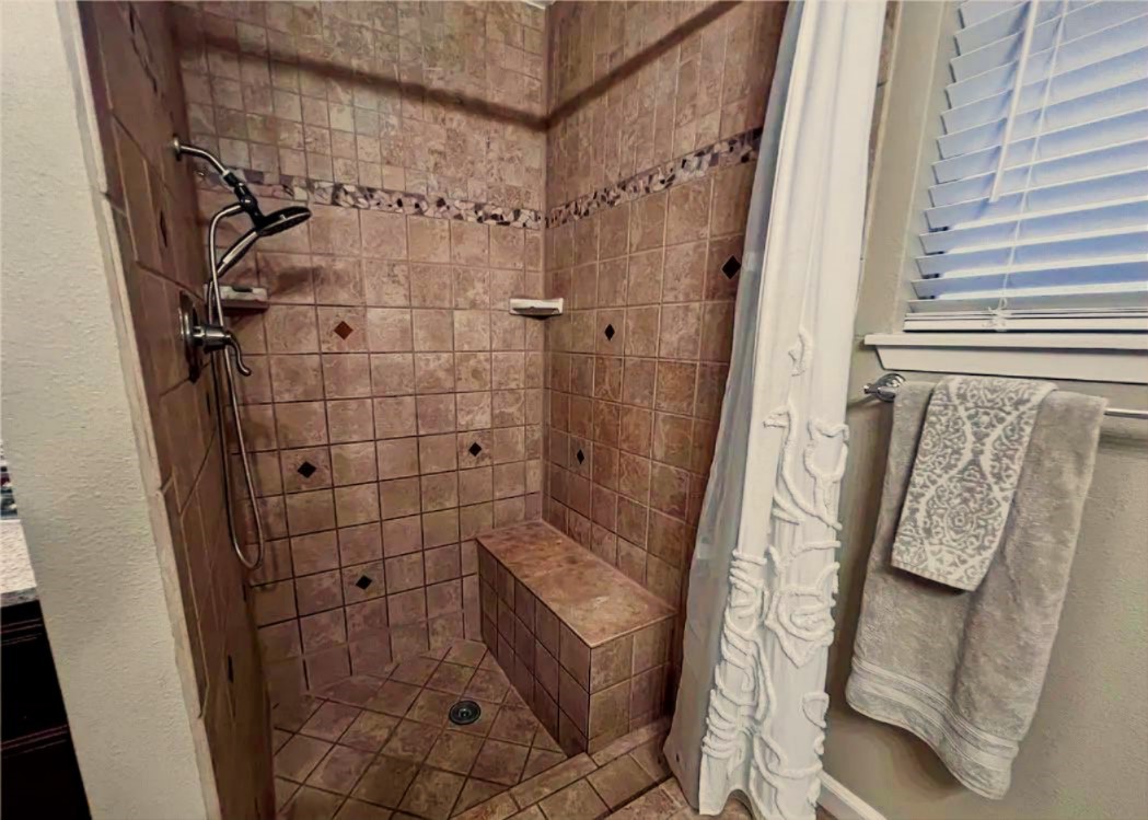 418 Seco Drive Portland, TX 78374 - Photo 28 of 32 a bathroom with a shower