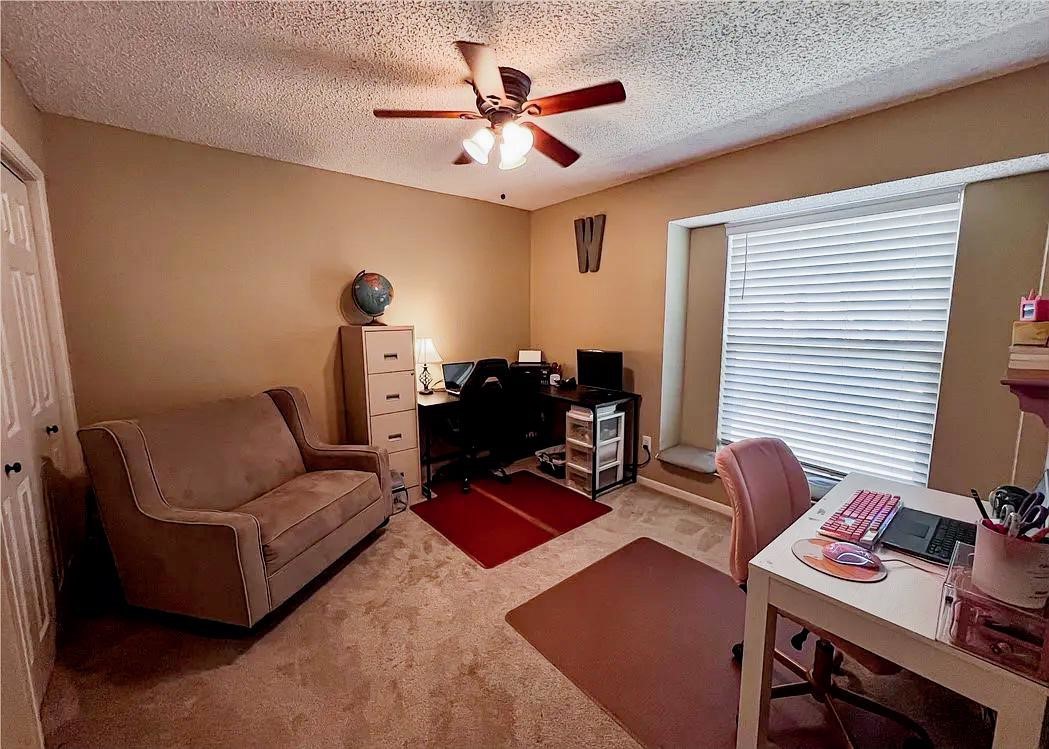 418 Seco Drive Portland, TX 78374 - Photo 30 of 32 a living room with furniture and a window