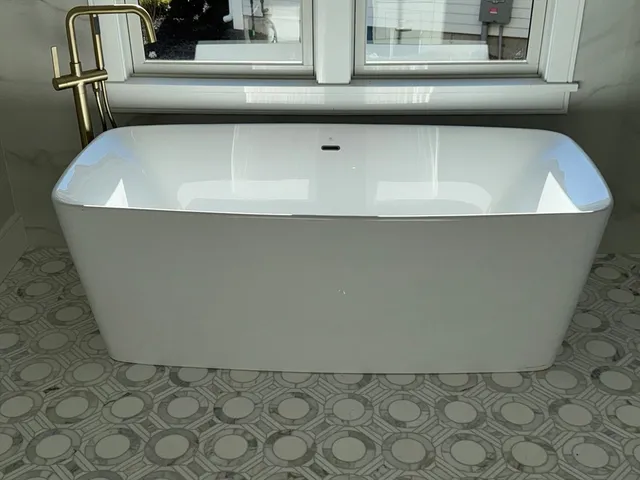 a close view of dining table and chairs