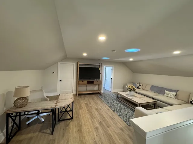 a view of a park with large trees