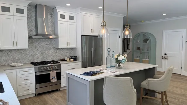 a kitchen with a stove a sink and a refrigerator