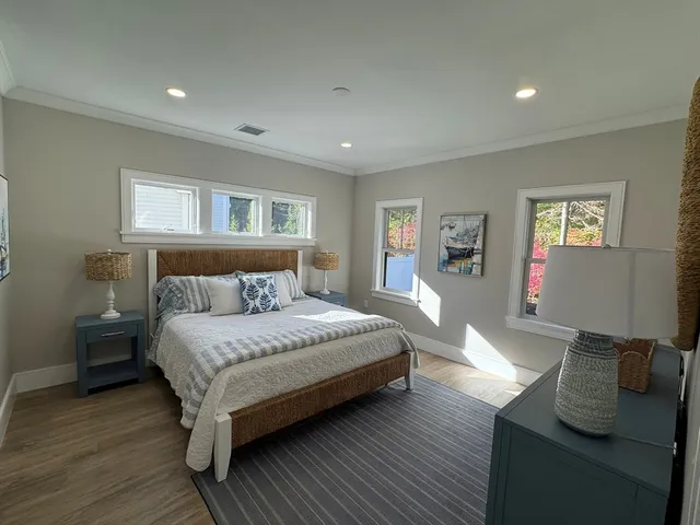 a bathroom with a tub sink and shower