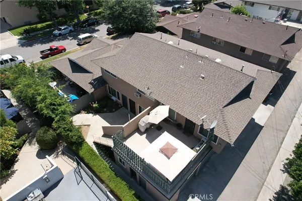 an aerial view of house with yard