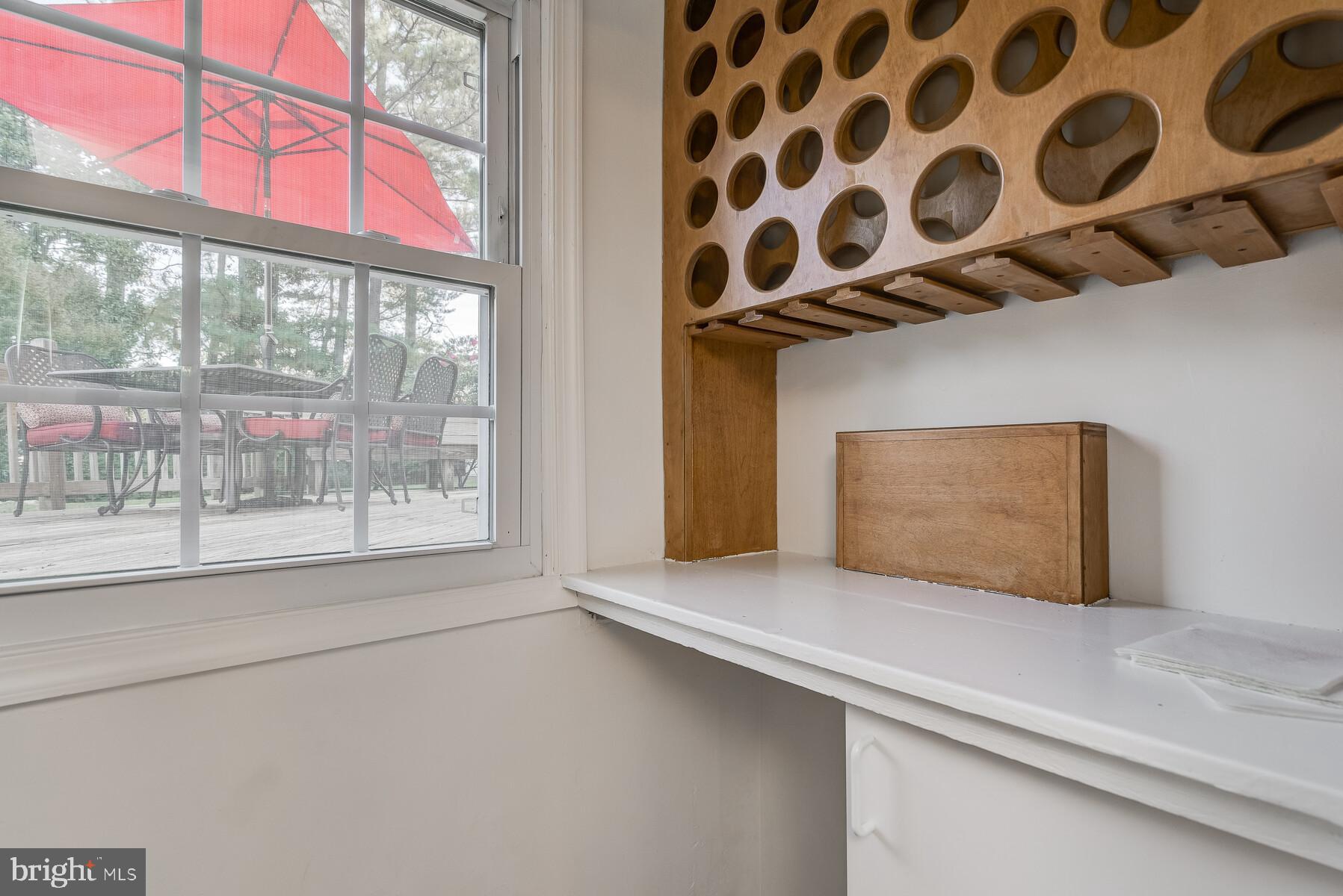 5717 Ogden Road Bethesda, MD 20816 - Photo 44 of 58 A view through the window to the deck