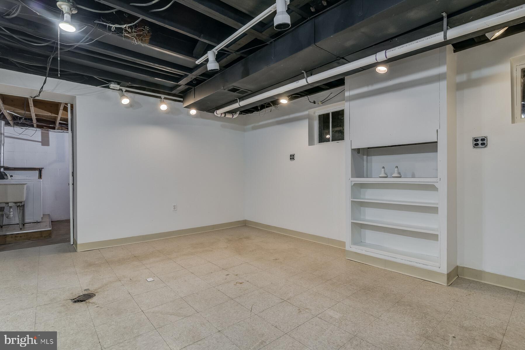 5717 Ogden Road Bethesda, MD 20816 - Photo 47 of 58 Lowest level rec room