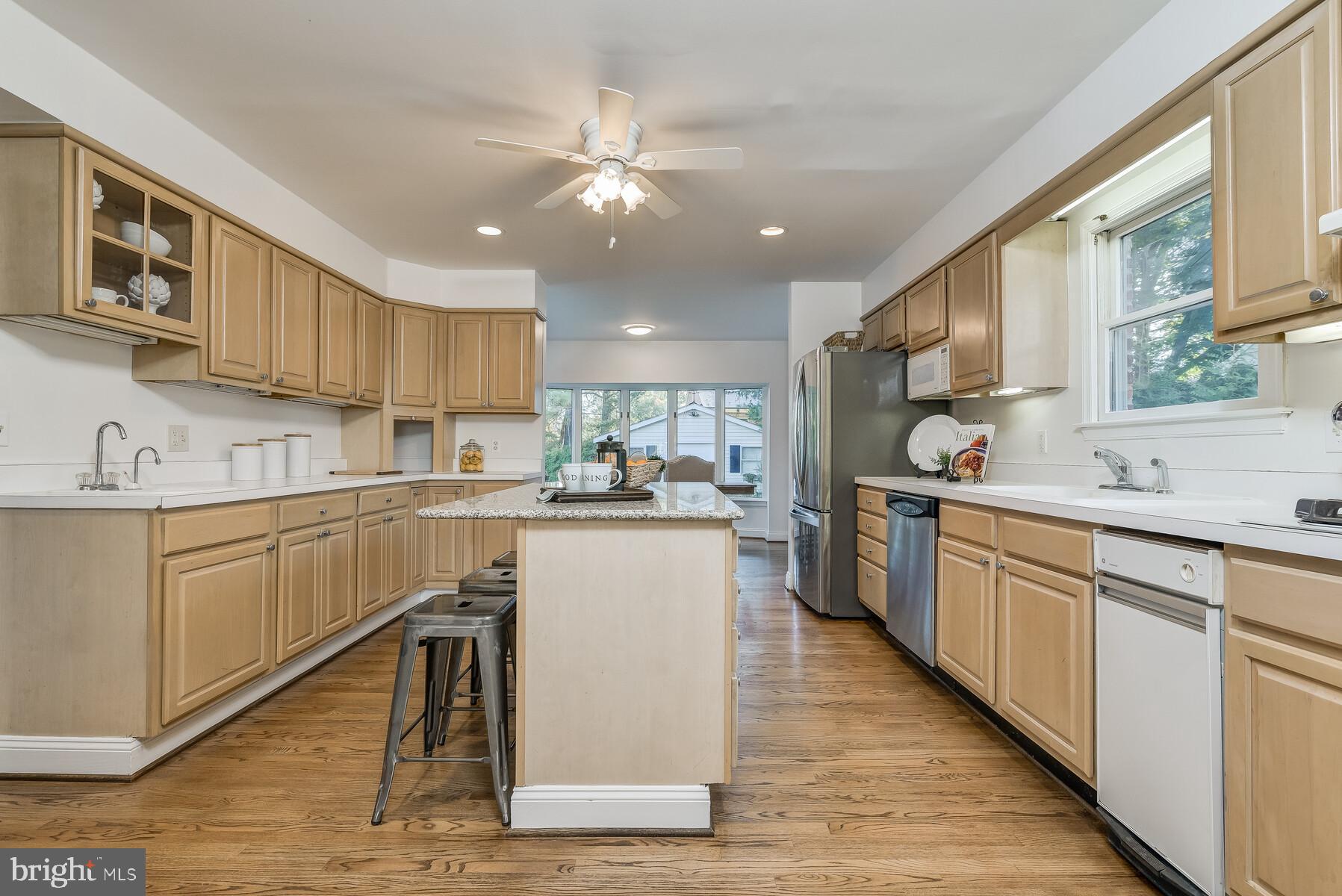 5717 Ogden Road Bethesda, MD 20816 - Photo 10 of 58 Kitchen addition with center island/ganite top