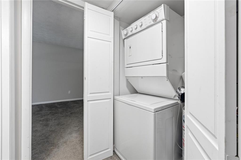 1150 Collier Road Northwest, Unit 4C Atlanta, GA 30318 - Photo 18 of 27 a utility room with dryer and washer