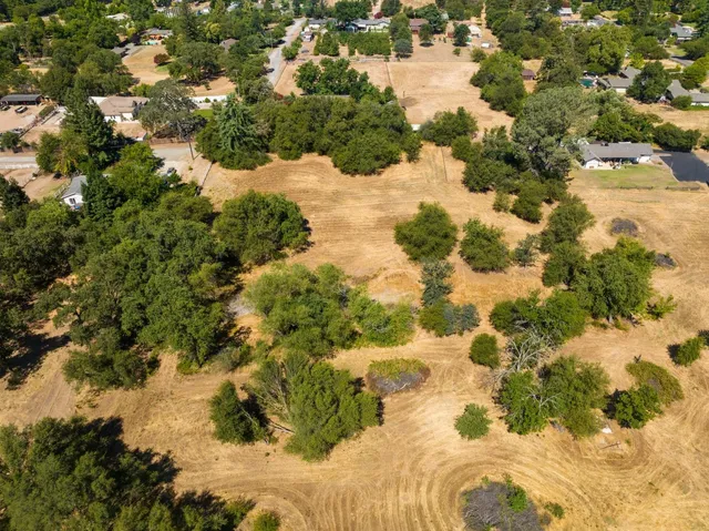 a view of a yard with an outdoor space
