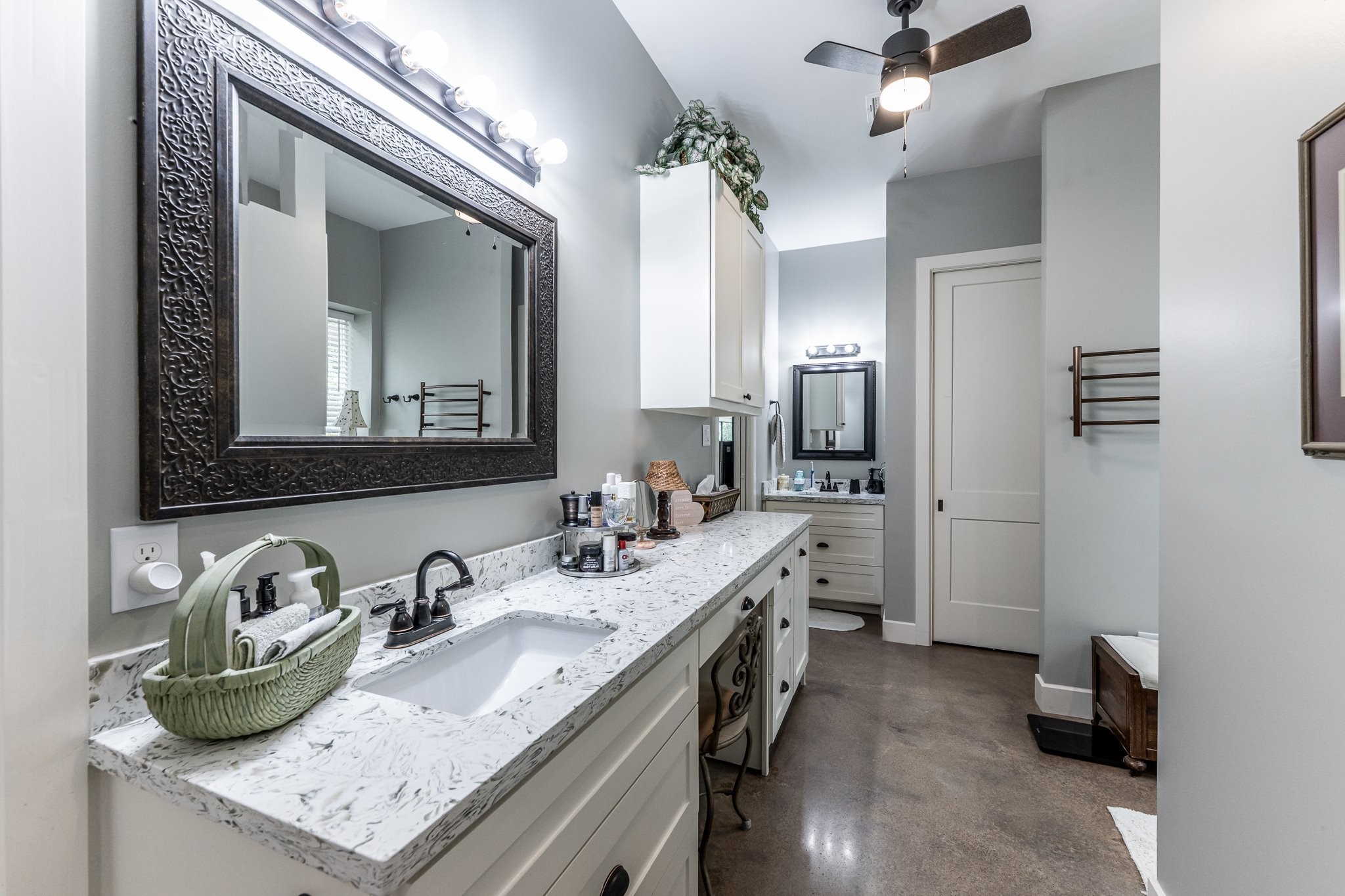 13334 Fultz Road Conroe, TX 77304 - Photo 14 of 49 The spa-inspired ensuite features dual vanities, elegant finishes, and a calming ambiance perfect for starting and ending your day.