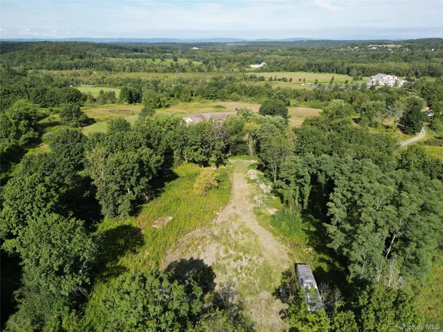 a view of lake with green space