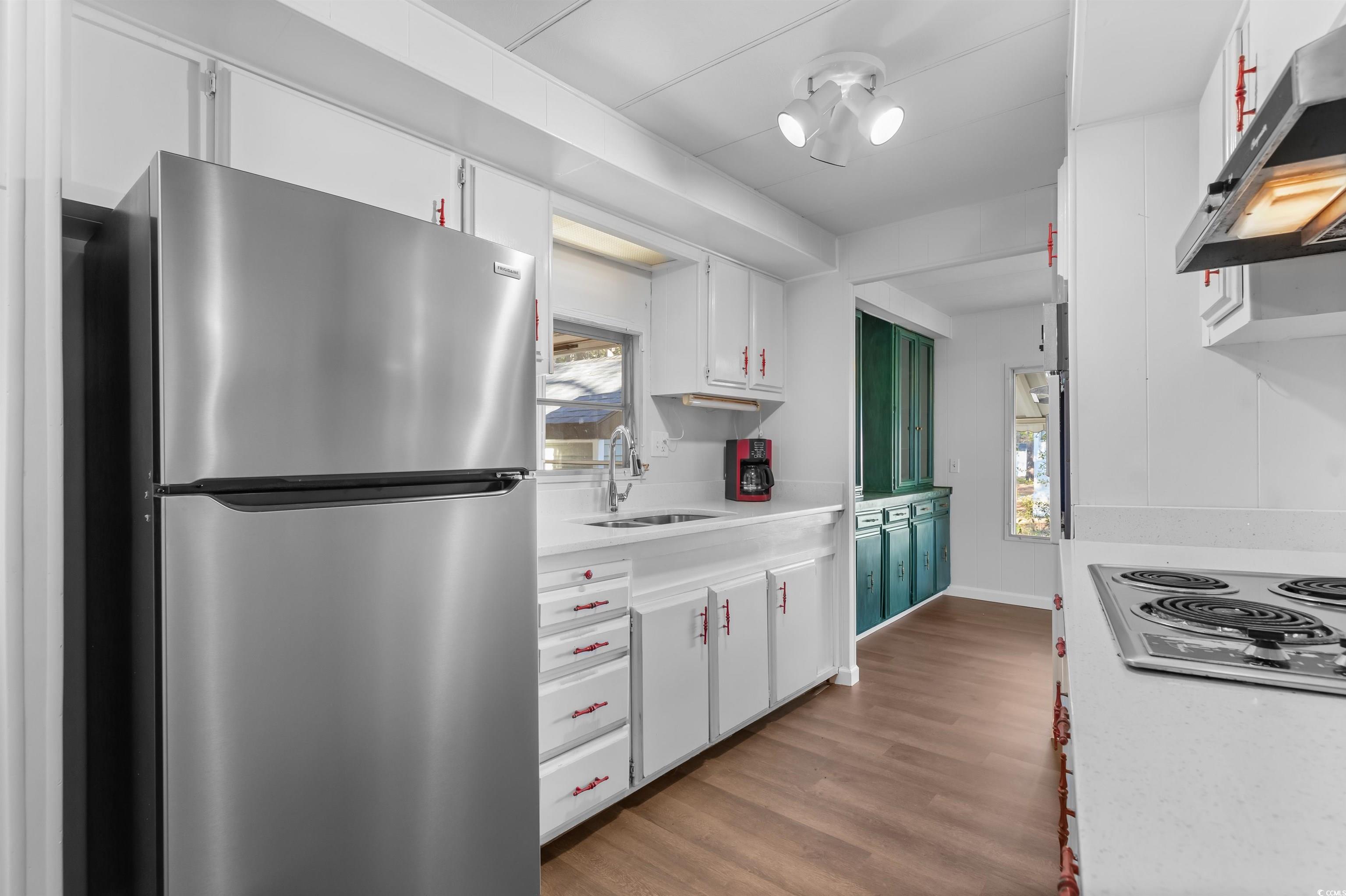 2950 Clemson Trail Murrells Inlet, SC 29576 - Photo 11 of 29 Kitchen with ventilation hood, white stovetop, sin
