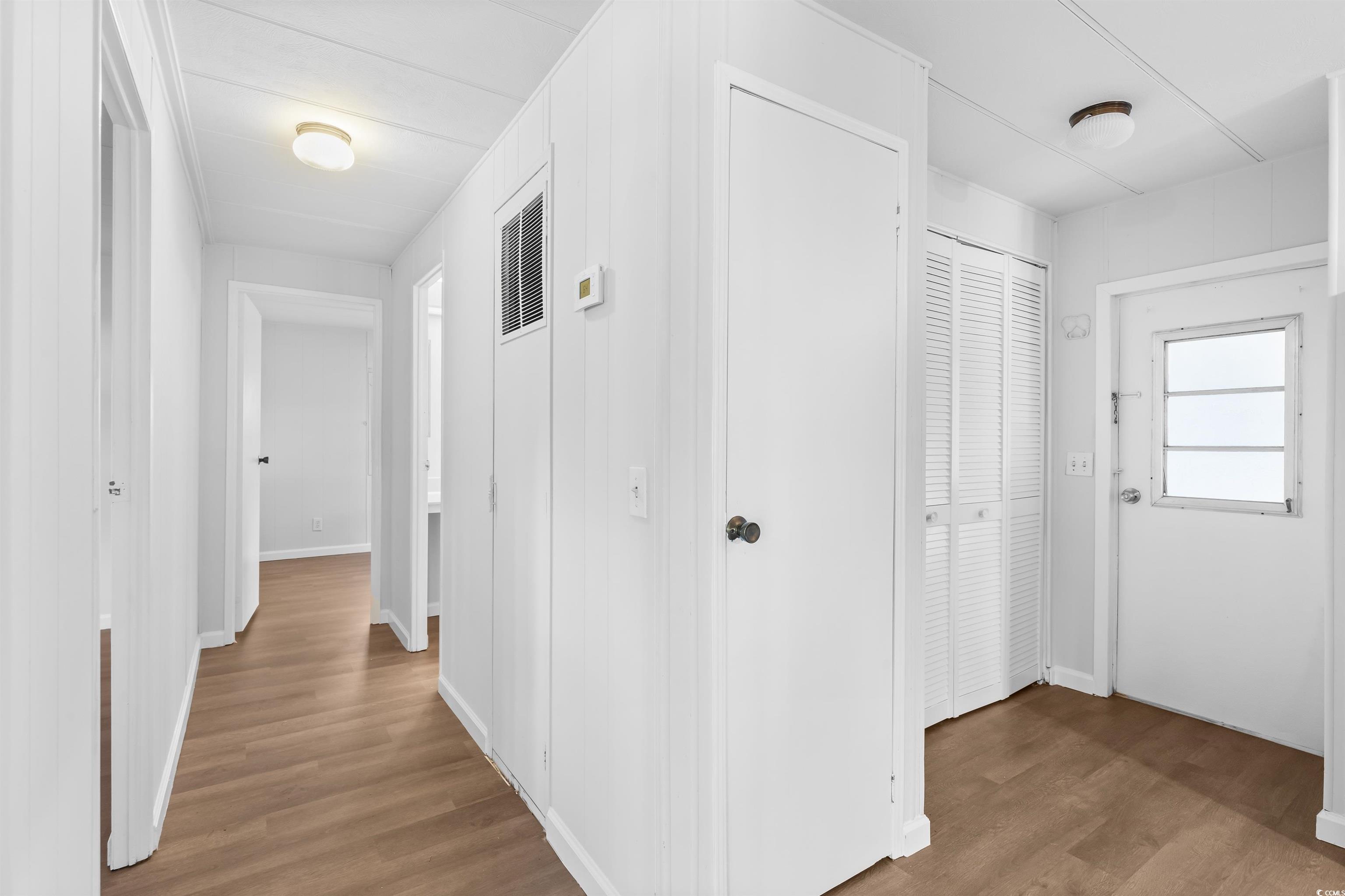 2950 Clemson Trail Murrells Inlet, SC 29576 - Photo 13 of 29 Hallway with light wood-type flooring