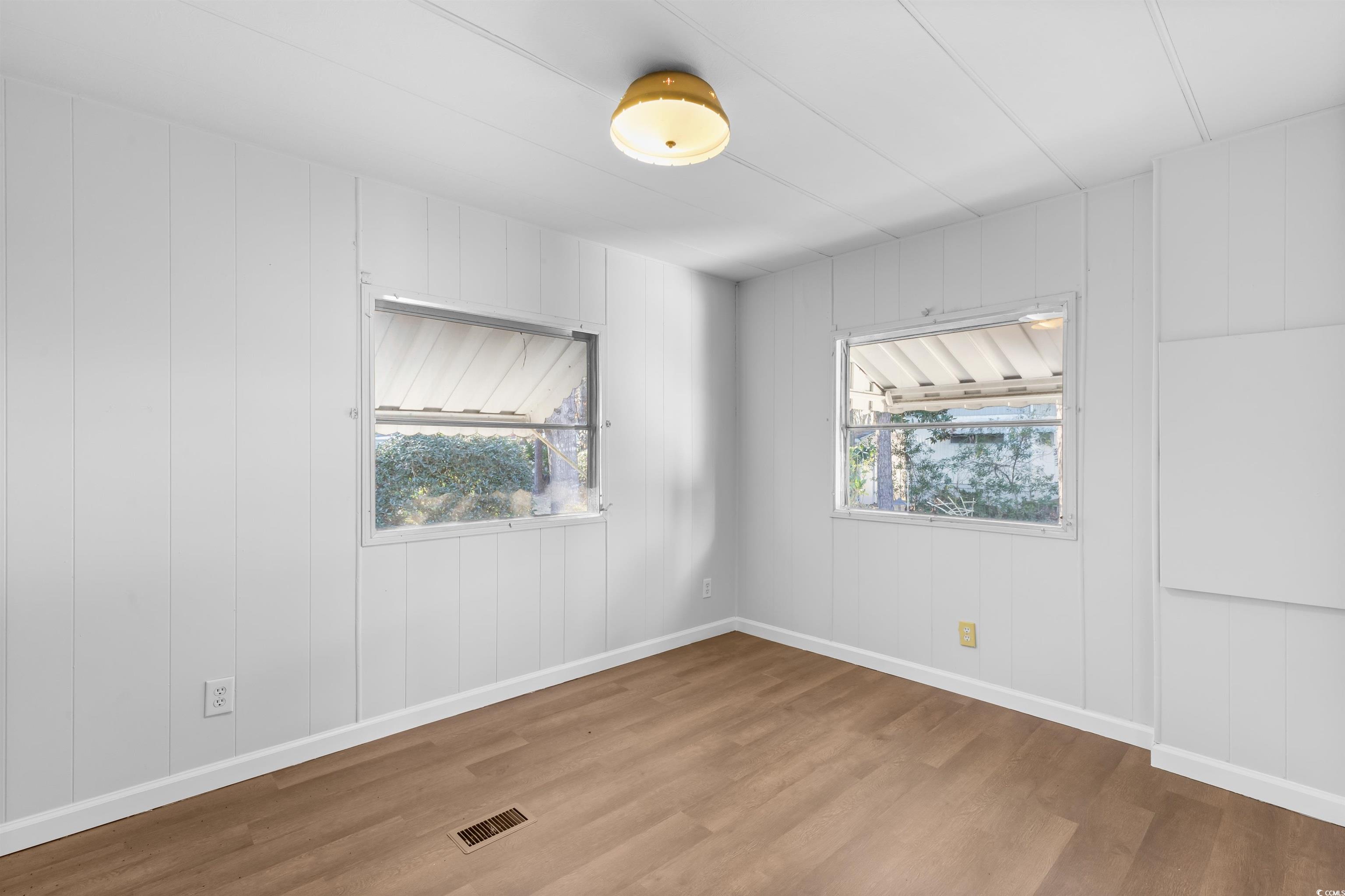 2950 Clemson Trail Murrells Inlet, SC 29576 - Photo 17 of 29 Unfurnished room featuring light hardwood / wood-s