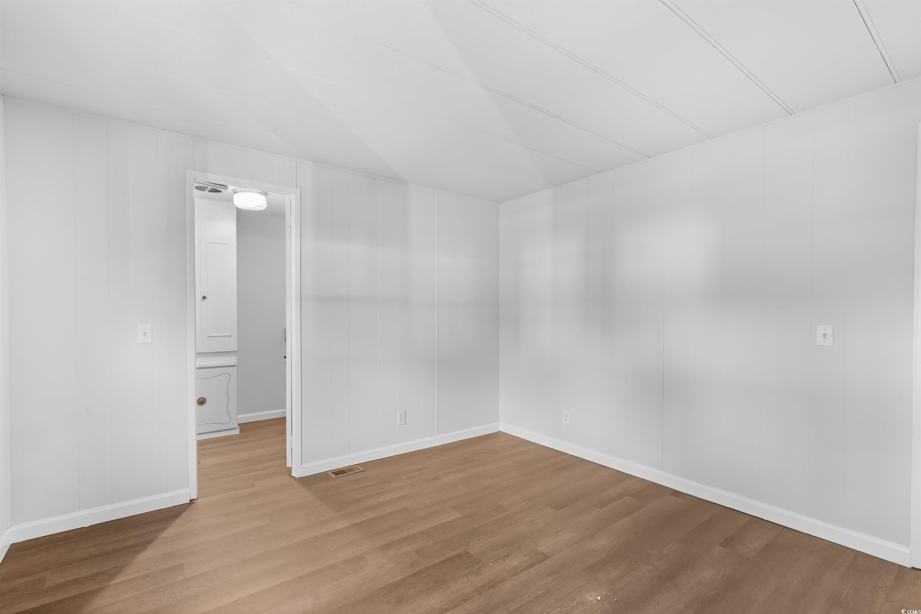 2950 Clemson Trail Murrells Inlet, SC 29576 - Photo 19 of 29 Spare room featuring hardwood / wood-style floors