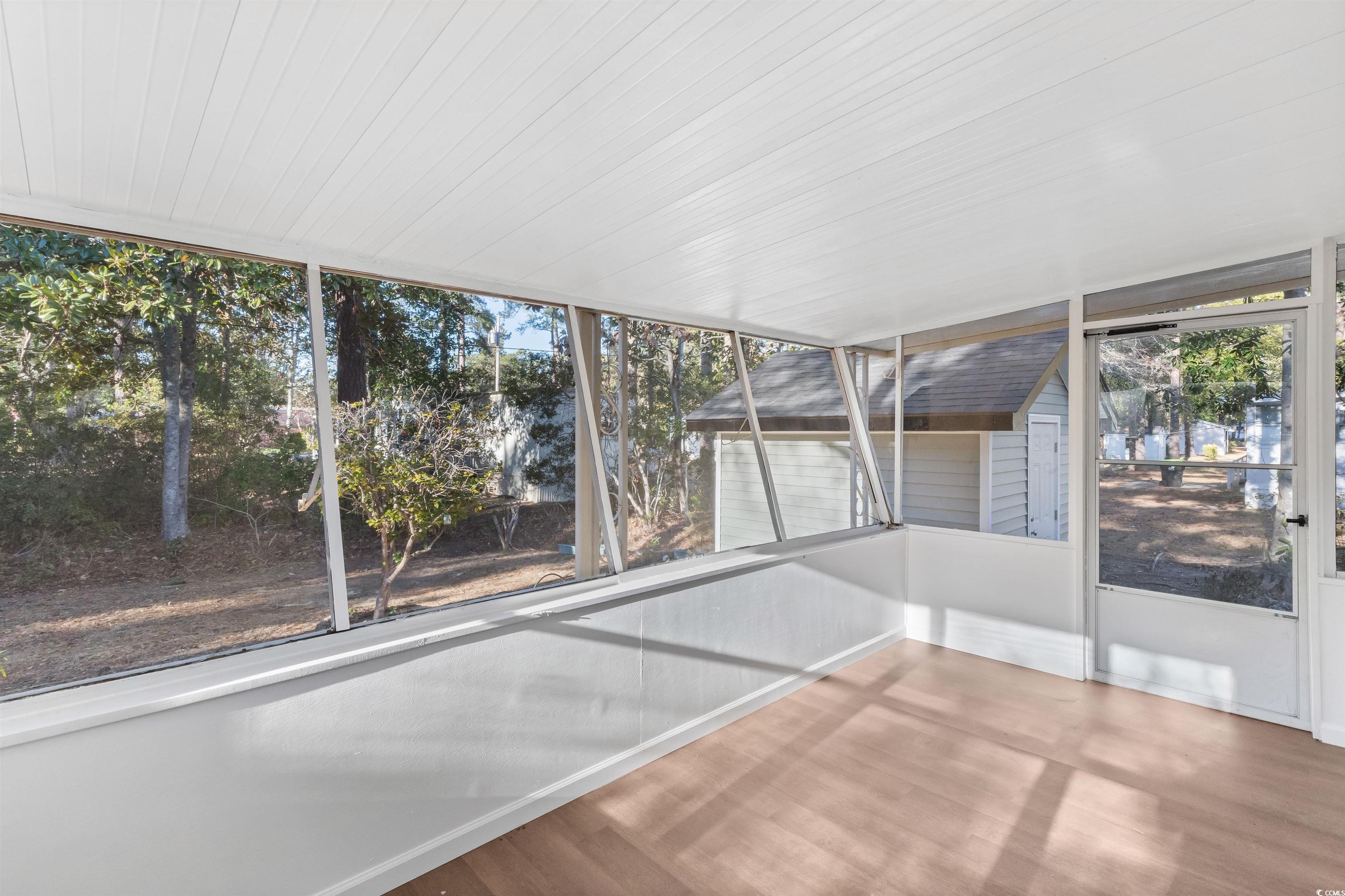 2950 Clemson Trail Murrells Inlet, SC 29576 - Photo 22 of 29 Unfurnished sunroom featuring wooden ceiling