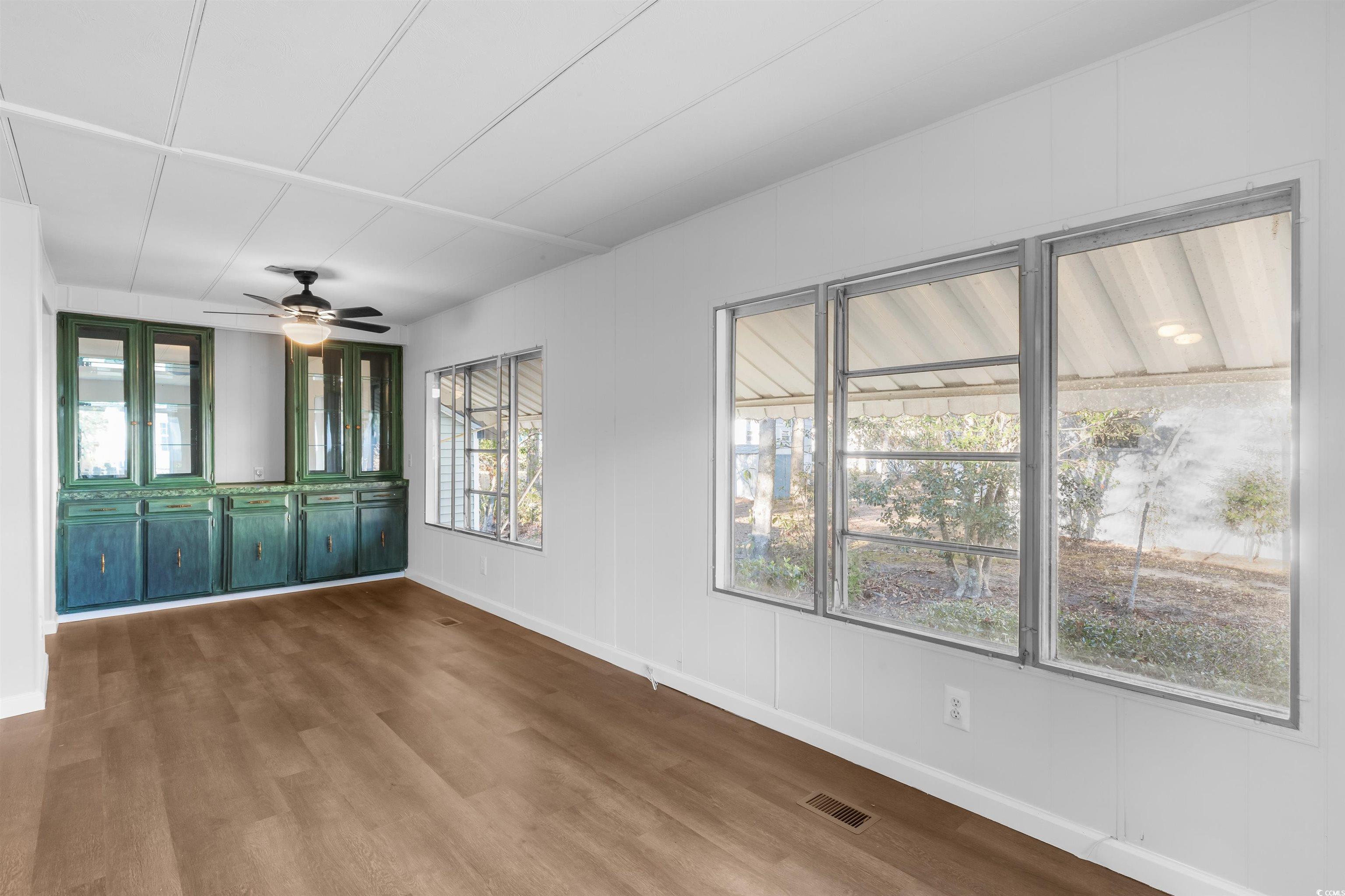 2950 Clemson Trail Murrells Inlet, SC 29576 - Photo 6 of 29 Unfurnished room with ceiling fan, a healthy amoun