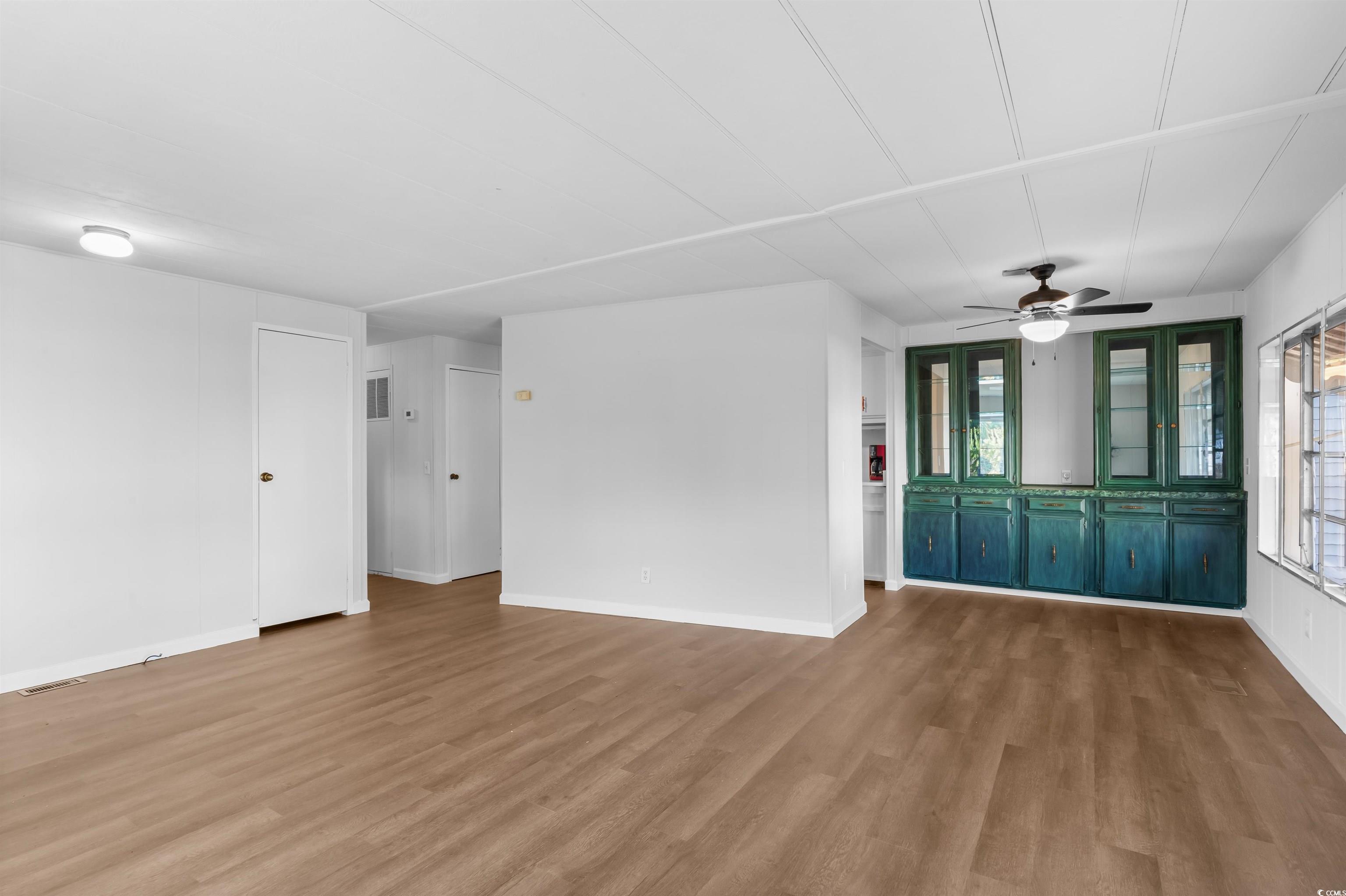 2950 Clemson Trail Murrells Inlet, SC 29576 - Photo 7 of 29 Spare room with ceiling fan, plenty of natural lig