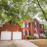 front view of house with a tree