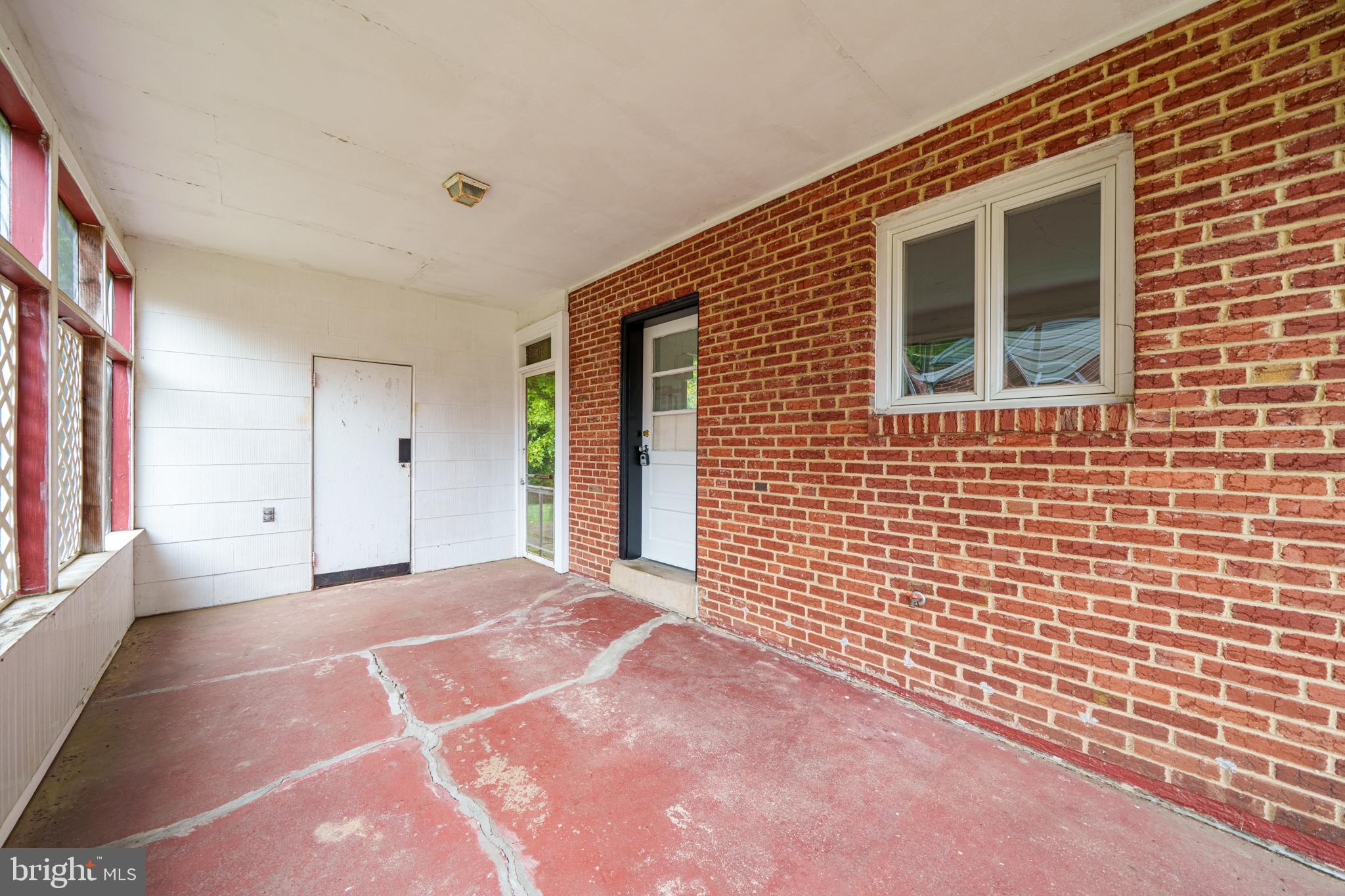 12 Homewood Road Wilmington, DE 19803 - Photo 19 of 20 Screened in porch with storage