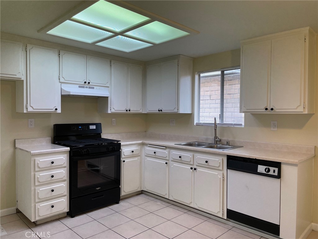 150 East Baseline Road, Unit A San Dimas, CA 91773 - Photo 5 of 13 a kitchen with cabinets appliances and a window