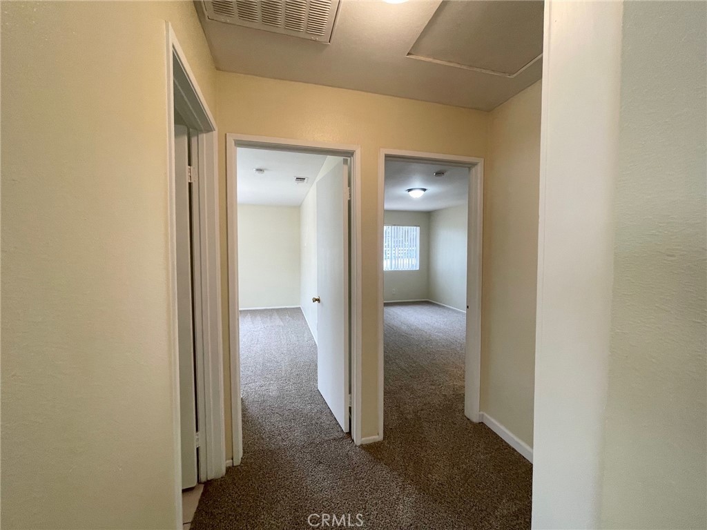 150 East Baseline Road, Unit A San Dimas, CA 91773 - Photo 6 of 13 a view of a hallway with wooden floor