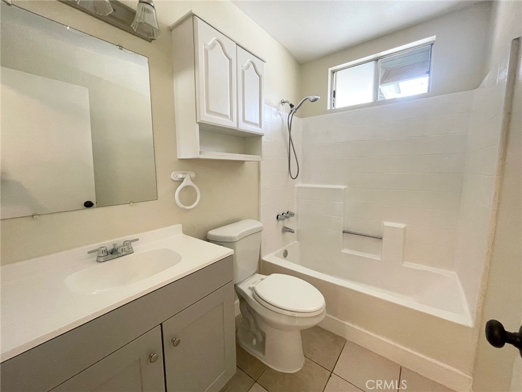 150 East Baseline Road, Unit A San Dimas, CA 91773 - Photo 7 of 13 a bathroom with a sink a toilet and shower