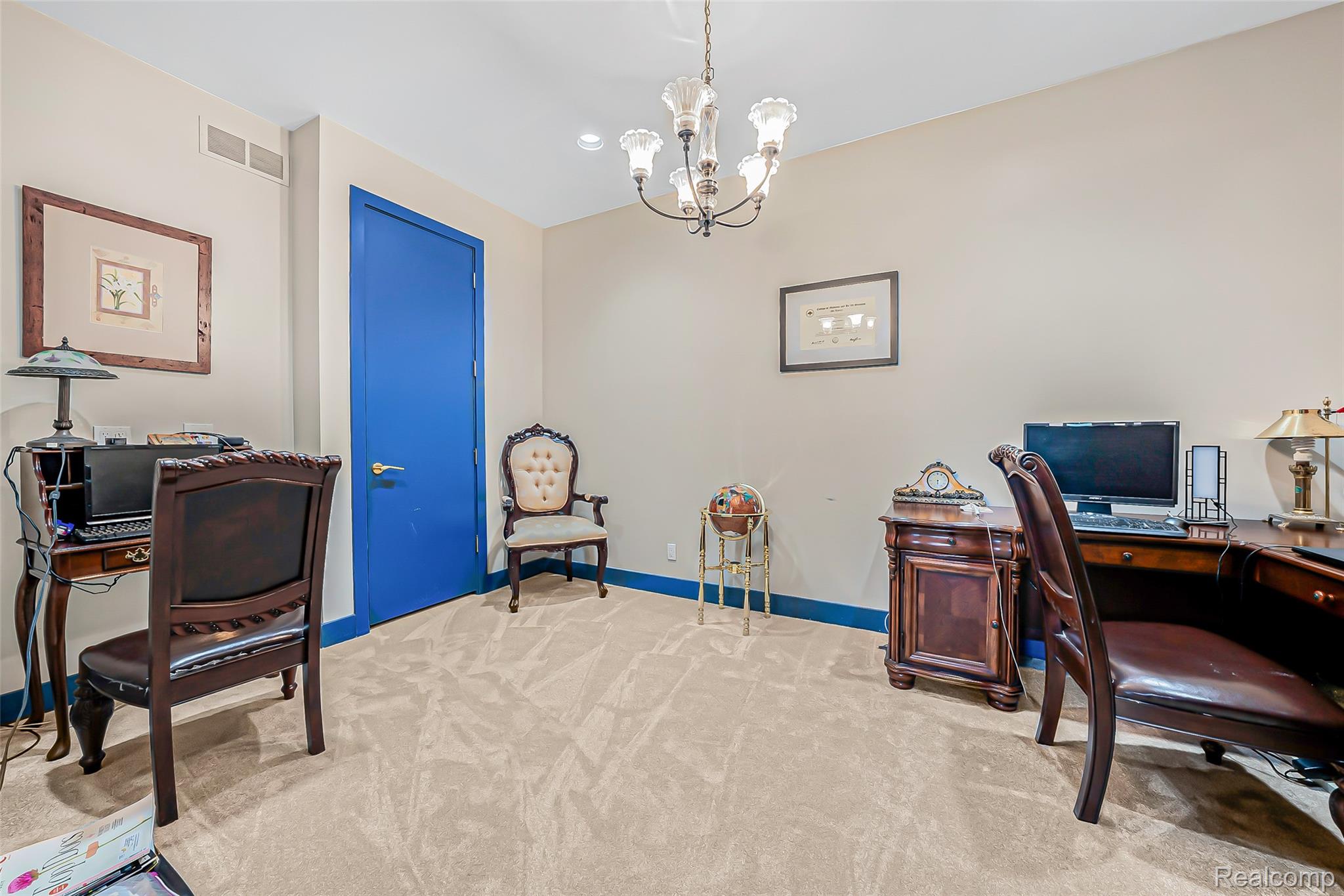 2785 Cranbrook Ridge Court Rochester, MI 48306 - Photo 21 of 99 Plush carpet flooring, light-toned walls, and a multi-light chandelier