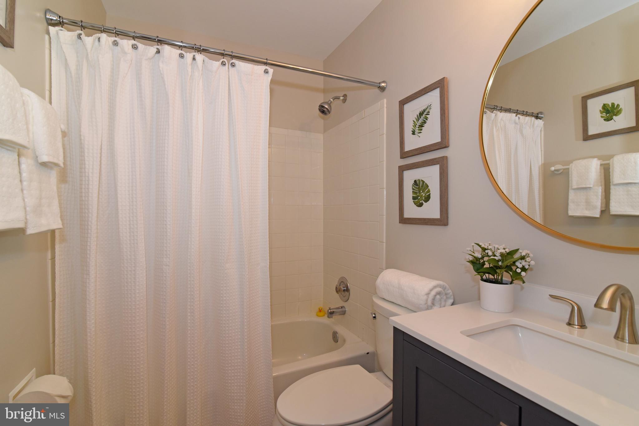 11940 Sentinel Point Court Reston, VA 20191 - Photo 30 of 43 Full hall bathroom with shower/tub.