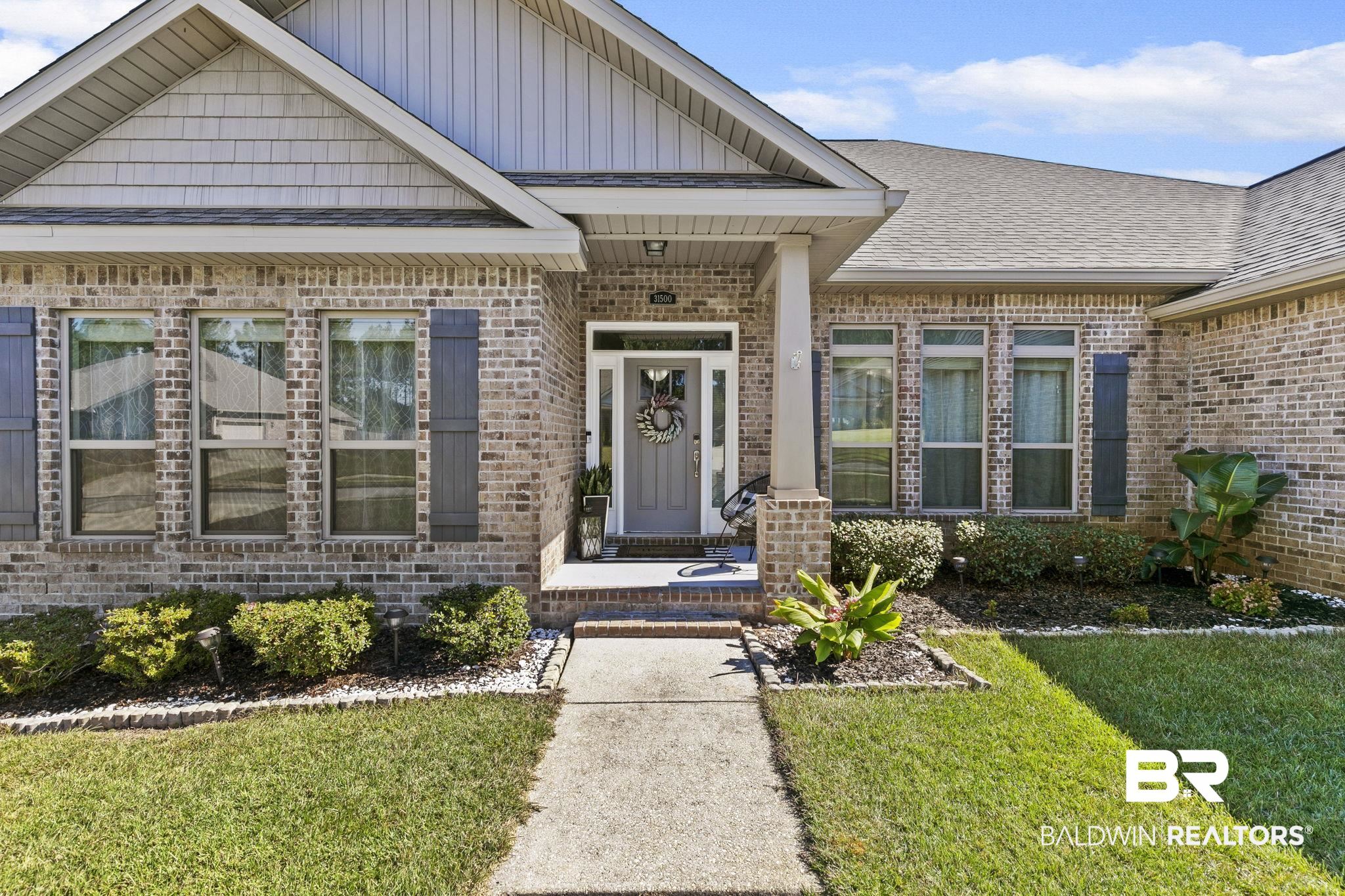 31500 Spoonbill Road Daphne, AL 36527 - Photo 4 of 85 Property entrance with a yard