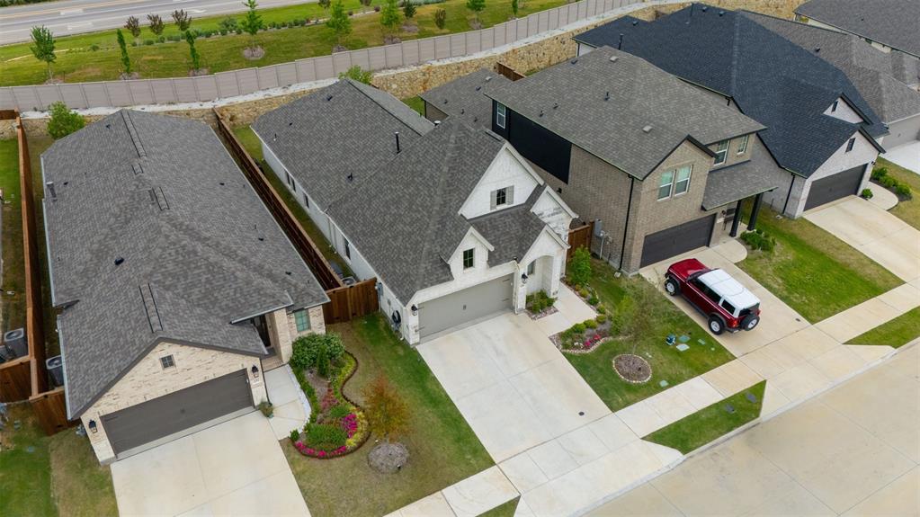 228 Palo Duro Bend Rhome, TX 76078 - Photo 32 of 35 an aerial view of a house with a yard