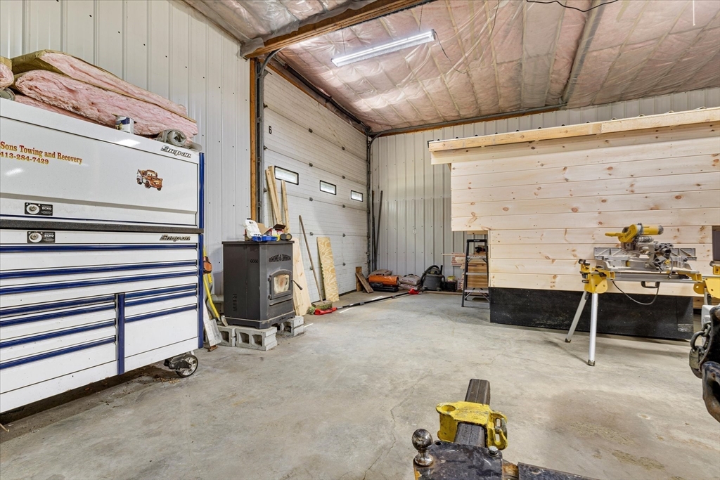 8 Oakwood Road Brimfield, MA 01010 - Photo 24 of 34 a room with gym equipment and mirrors