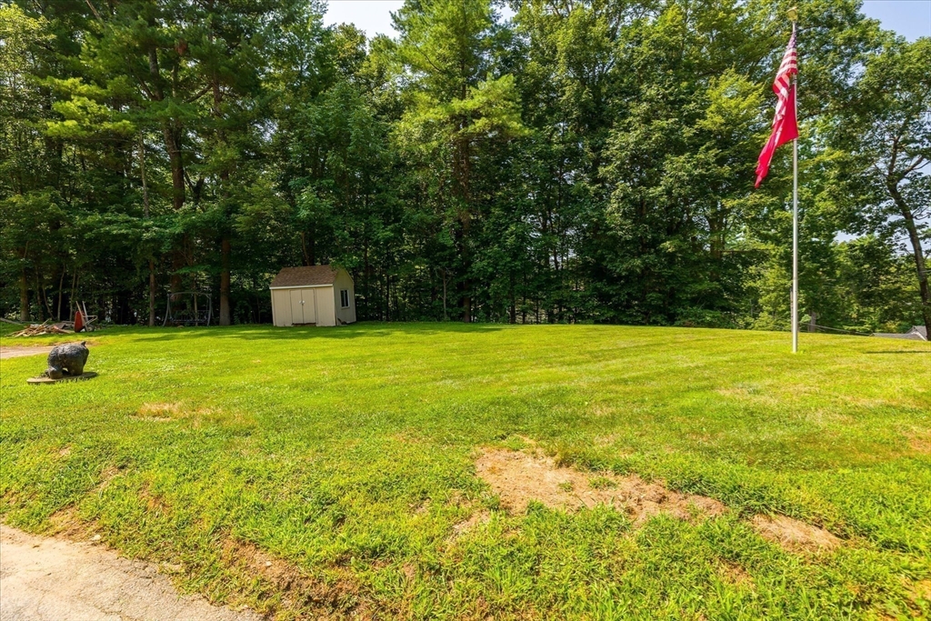 8 Oakwood Road Brimfield, MA 01010 - Photo 30 of 34 a view of a swimming pool with an outdoor space and seating area