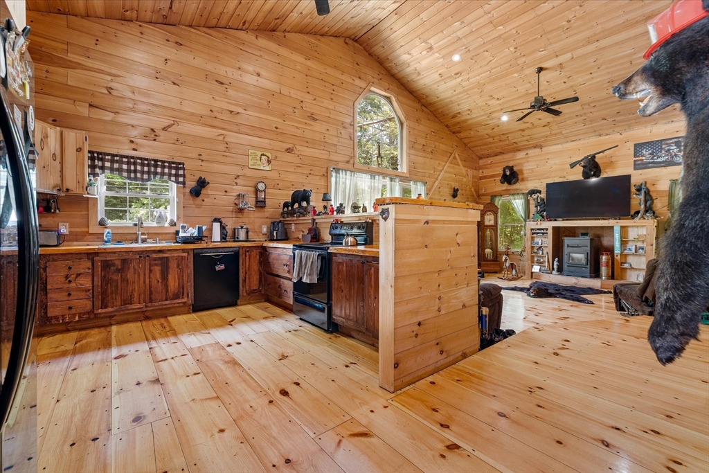 8 Oakwood Road Brimfield, MA 01010 - Photo 6 of 34 a view of kitchen with furniture and wooden floor