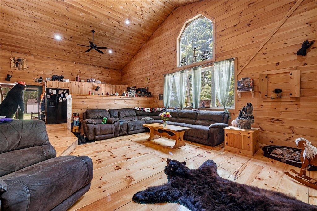 8 Oakwood Road Brimfield, MA 01010 - Photo 9 of 34 a living room with furniture fireplace and a large window