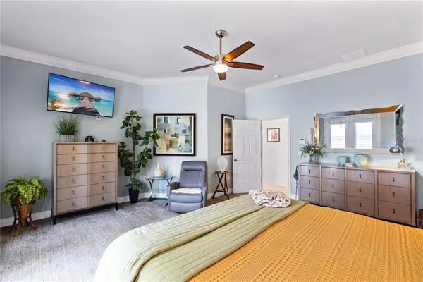 a bedroom with a bed and furniture