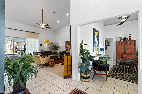 a living room with patio furniture