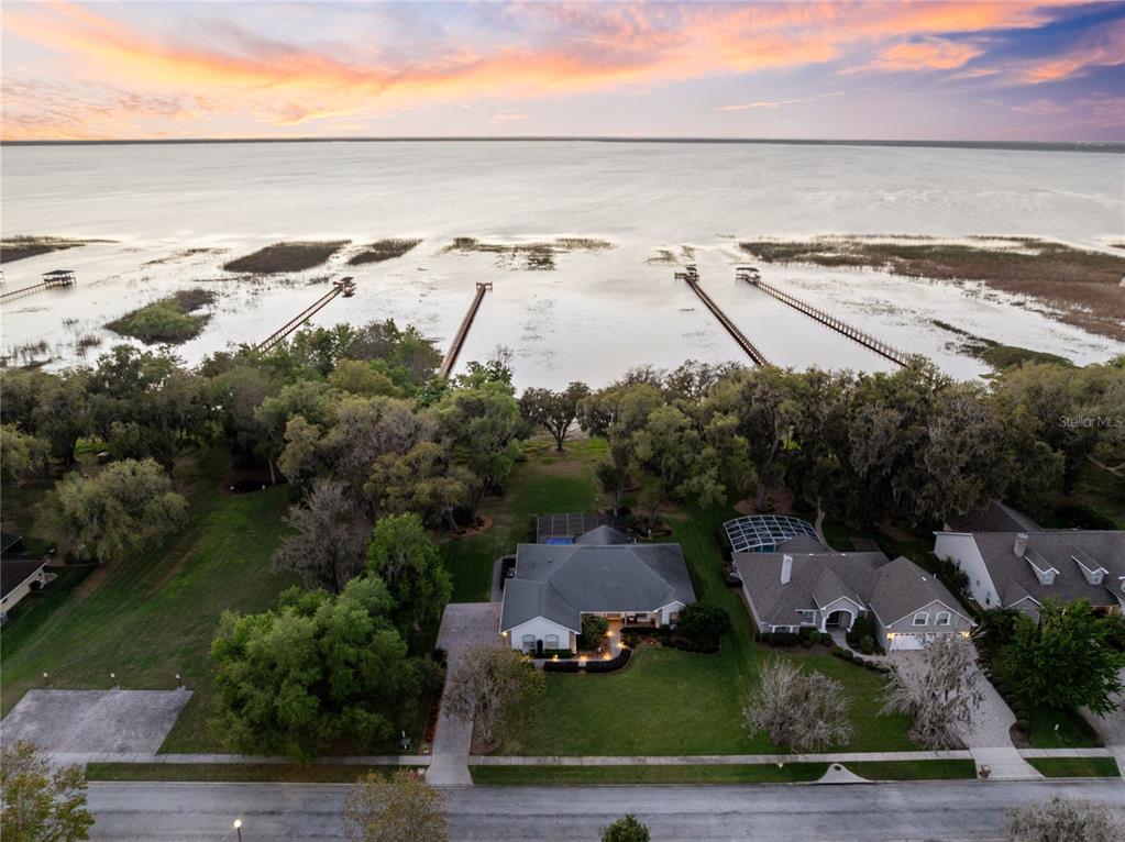 4846 Calasans Avenue St. Cloud, FL 34771 - Photo 2 of 61 an aerial view of residential houses with outdoor space and ocean