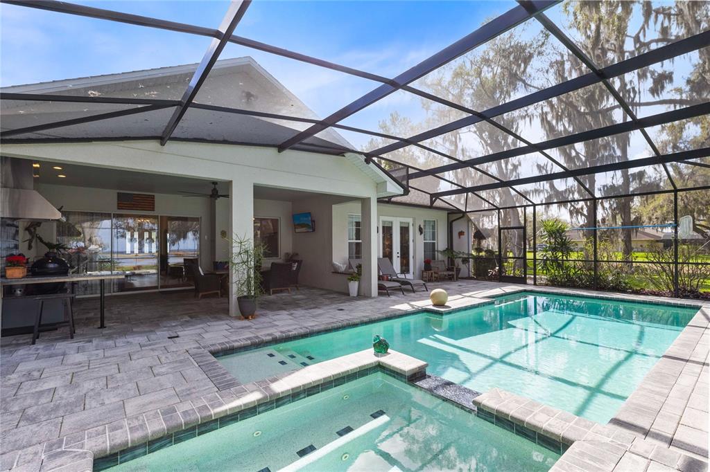 4846 Calasans Avenue St. Cloud, FL 34771 - Photo 35 of 61 a view of a swimming pool with a patio
