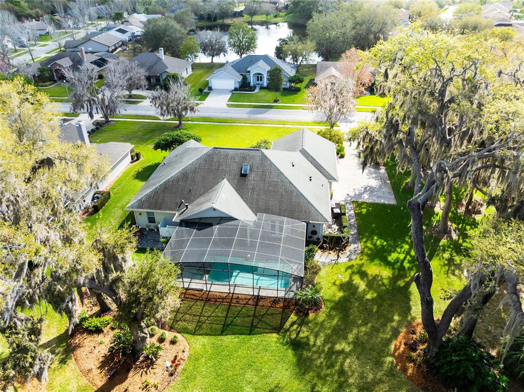 4846 Calasans Avenue St. Cloud, FL 34771 - Photo 42 of 61 a view of a house with a swimming pool