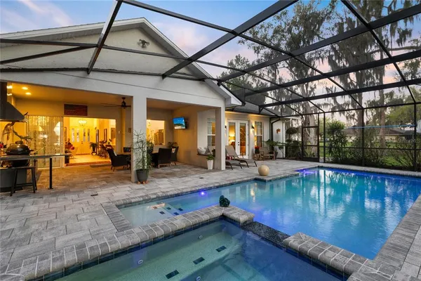 a view of a swimming pool with a patio