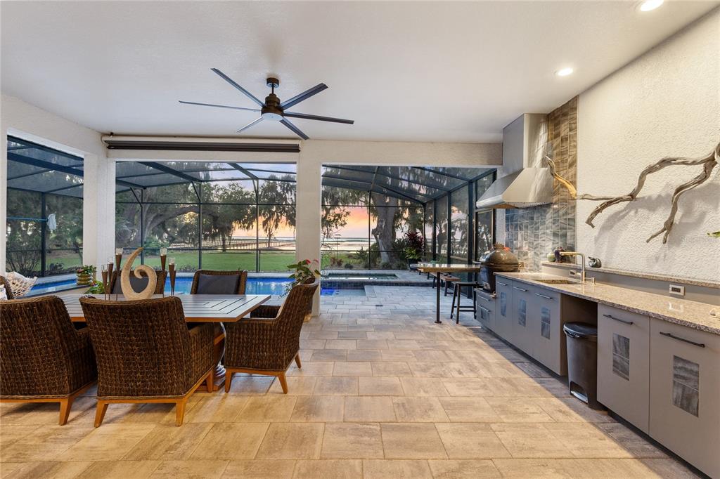 4846 Calasans Avenue St. Cloud, FL 34771 - Photo 6 of 61 a living room with patio furniture and a large window